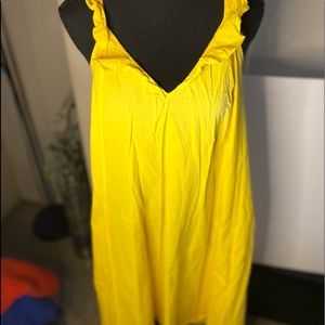 A cute bright yellow gently used summer dress.